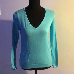 V-neck blue sweater